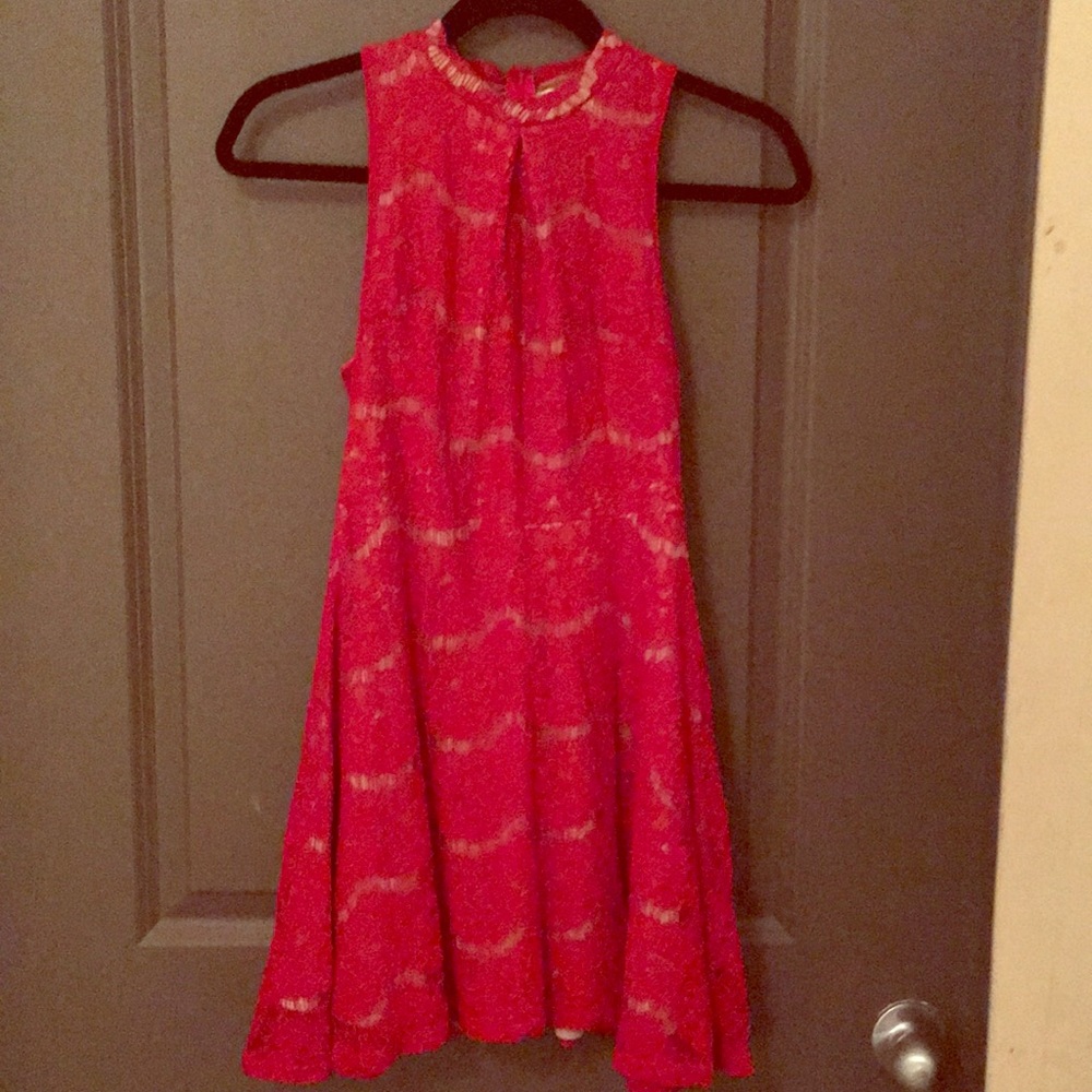 Lace party dress with nude lining.
